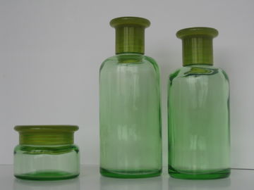 Πράσινα χρωματισμένα μπουκάλια 200ML 150ML 50G γυαλιού ουσιαστικού πετρελαίου με το μειωτή στομίων & την ΚΑΠ